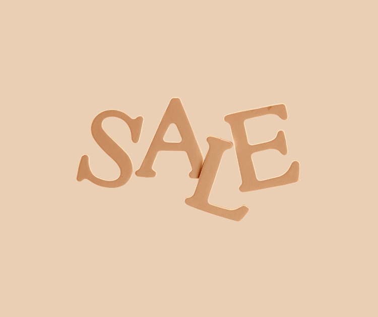 SALE Schriftzug in beige auf einfarbigem Hintergrund