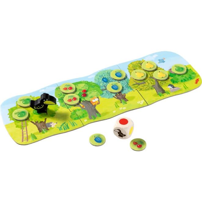 Spielbrett des Spiels ‚Kleiner Obstgarten‘ mit detaillierten Illustrationen von Obstbäumen und Wegen.